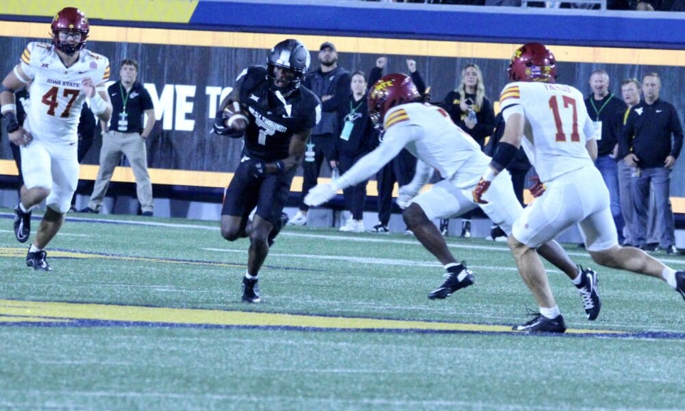 WVU Football RB Jahiem White running against Iowa State