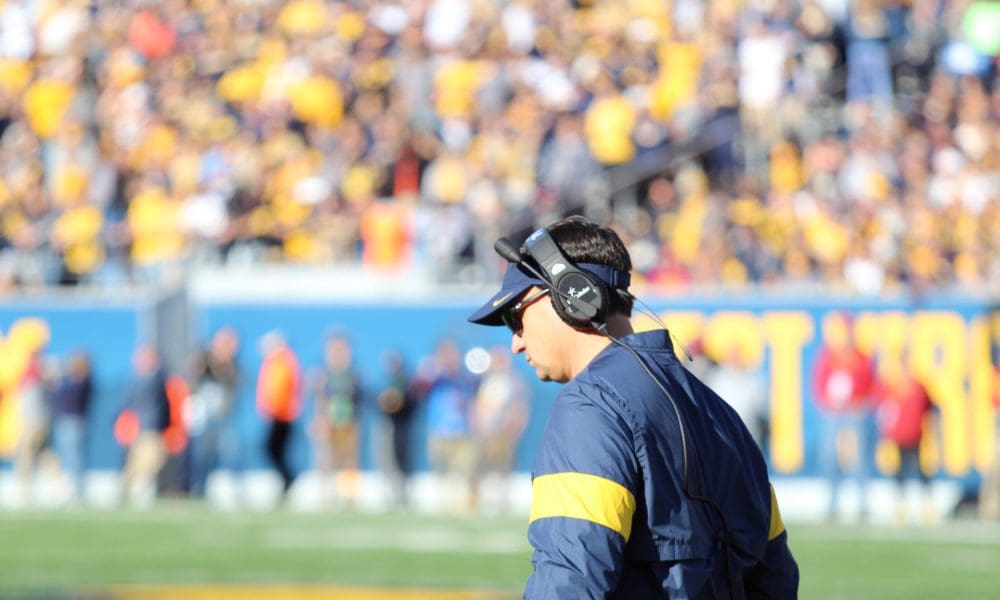 WVU Football HC Neal Brown head down