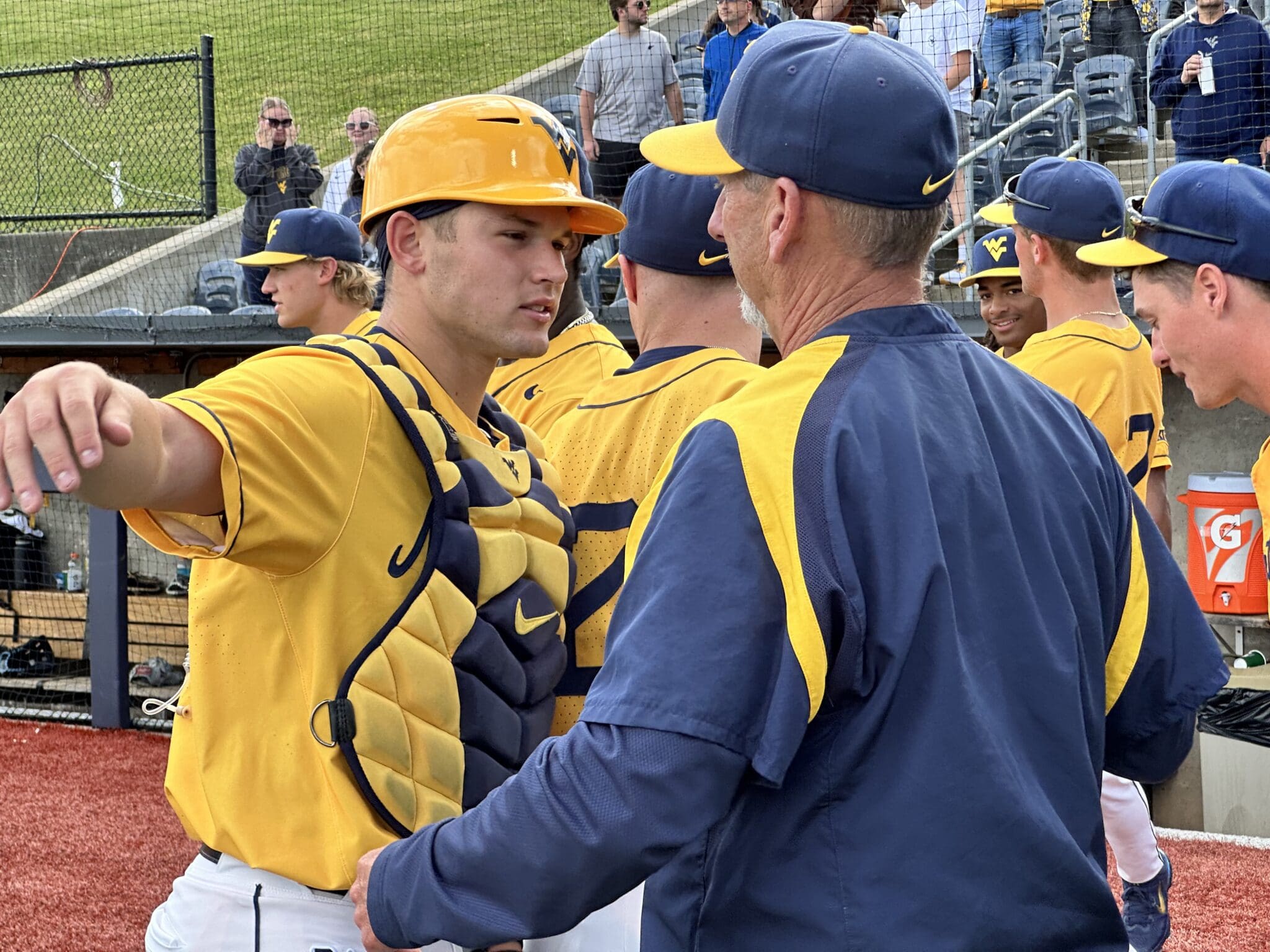 WVU Baseball HC Randy Mazey with team