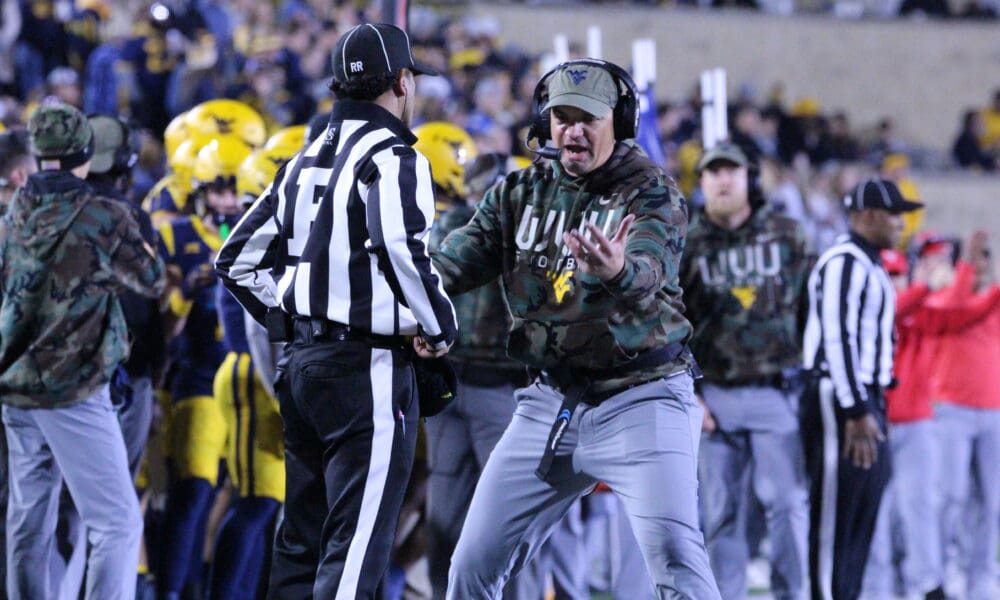 WVU Football HC Neal Brown and ref