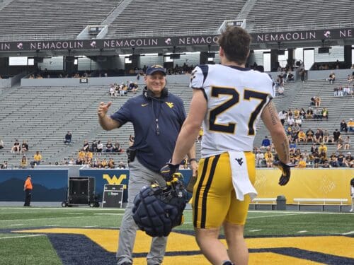 WVU Football HC Rich Rodriguez with RB Clay Ash