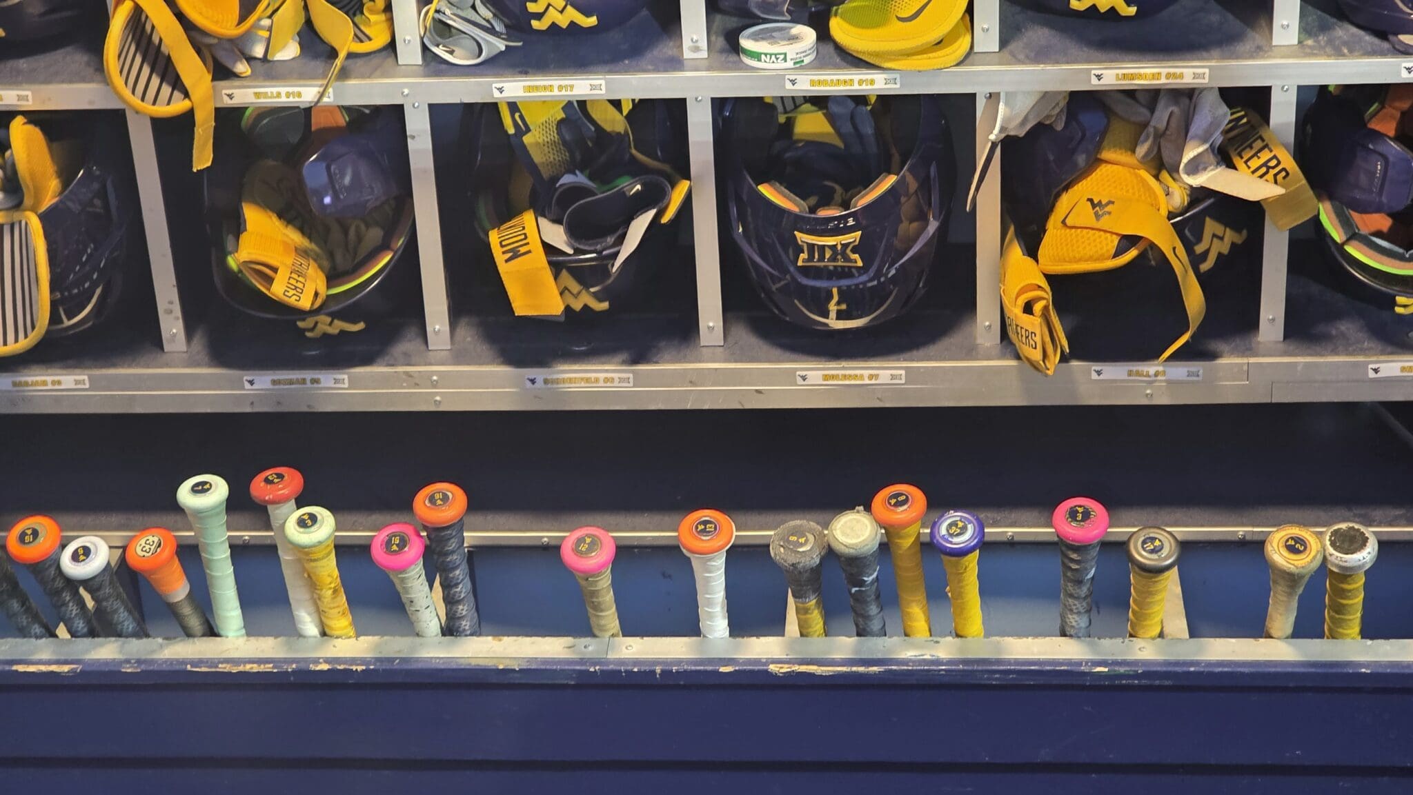 WVU Baseball Helmet and Bat STOCK PHOTO