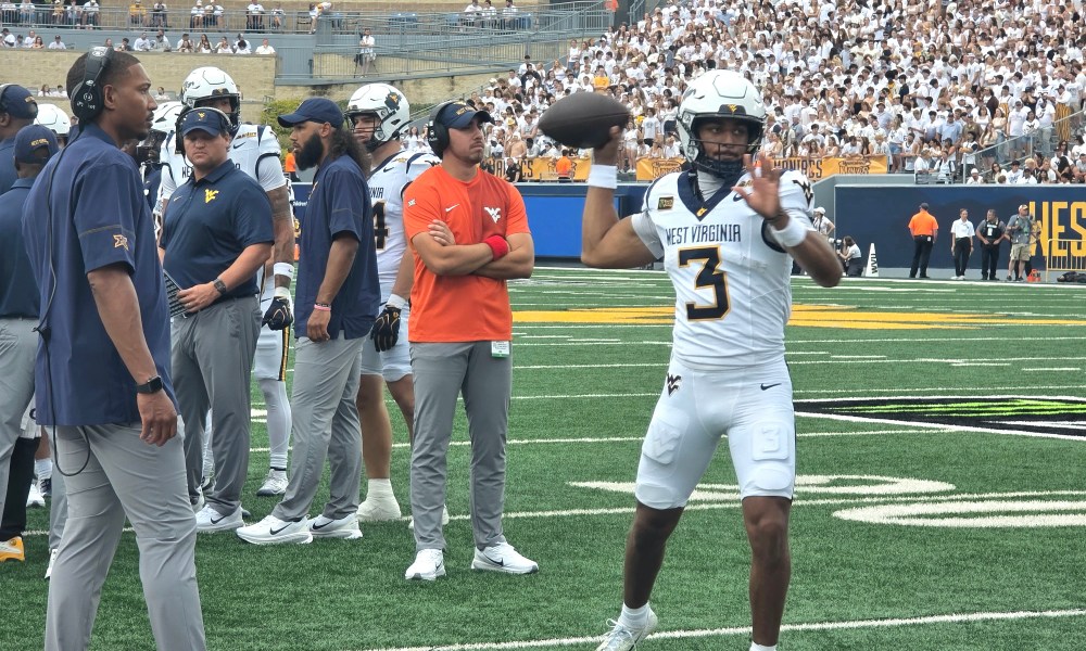 WVU Football QB Michael Hawkins warming up
