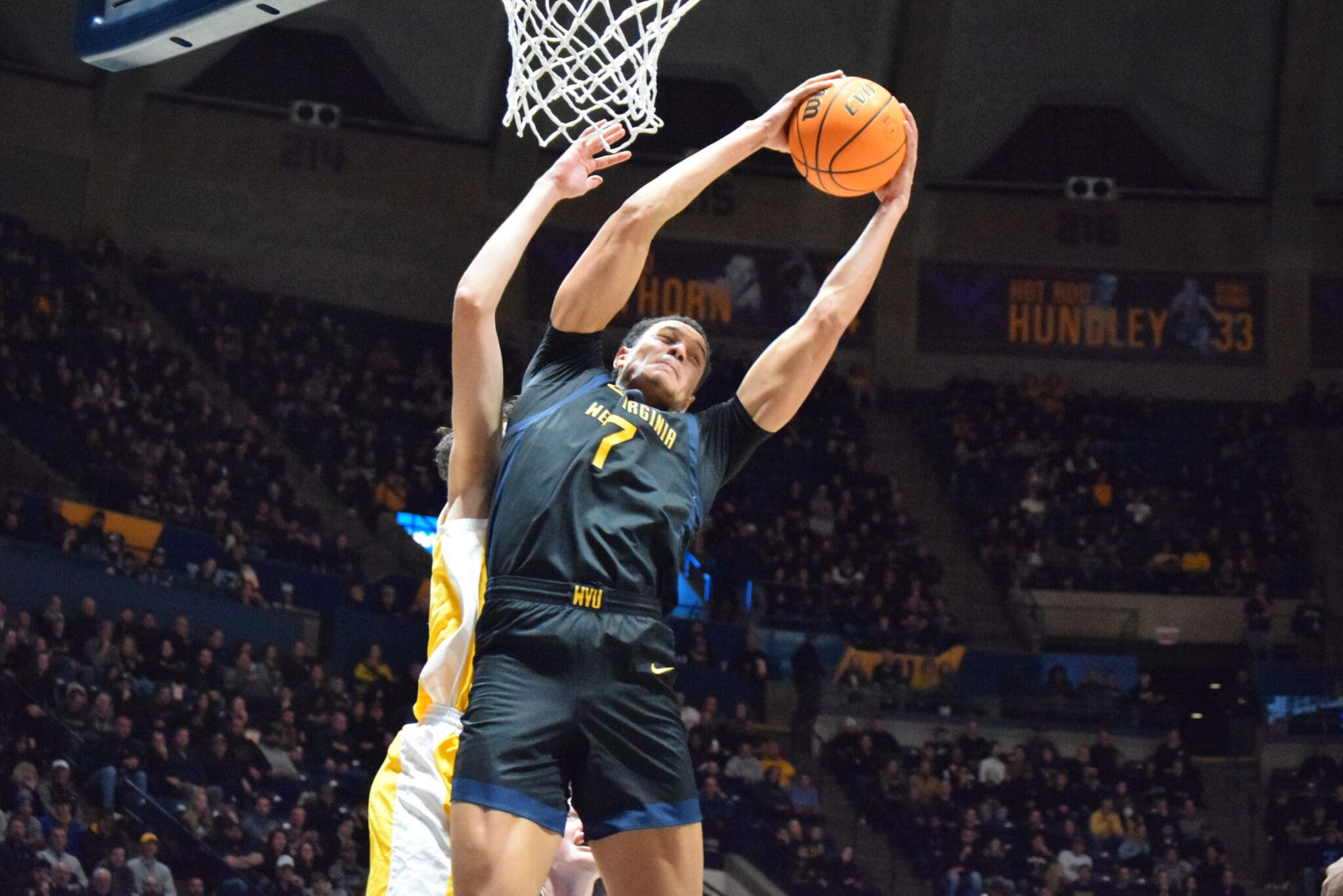 WVU Basketball Jesse Edwards Rebound