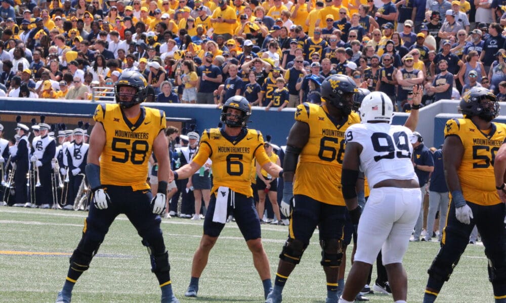 WVU Football QB Garrett Greene and OL Nick Malone against Penn State