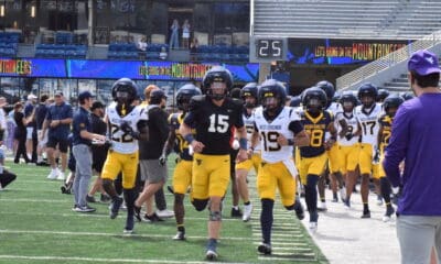 WVU Football QB Scotty Fox running on field for spring scrimmage