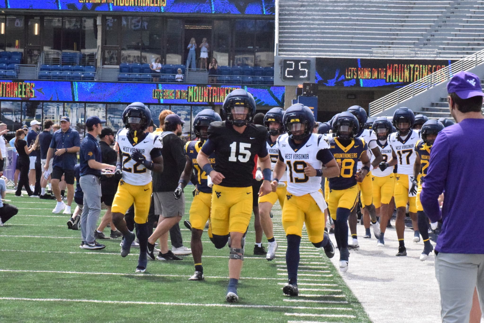 WVU Football QB Scotty Fox running on field for spring scrimmage