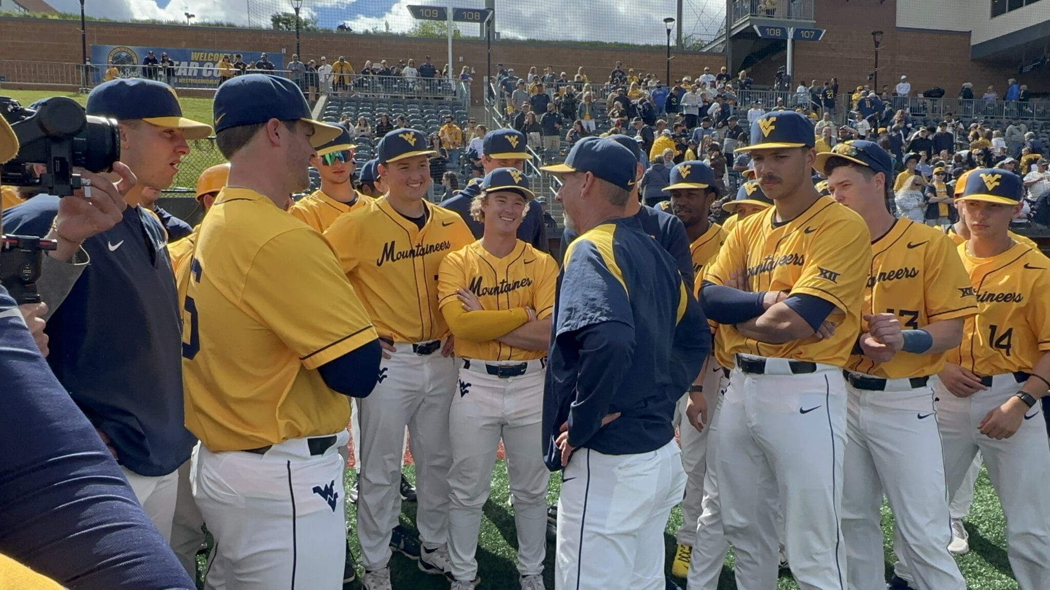 WVU Baseball HC Randy Mazey with WVU baseball team