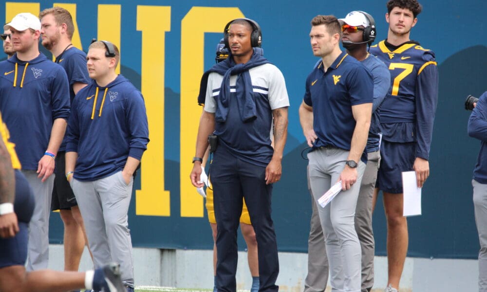 Pat White on WVU sidelines with Kole Taylor