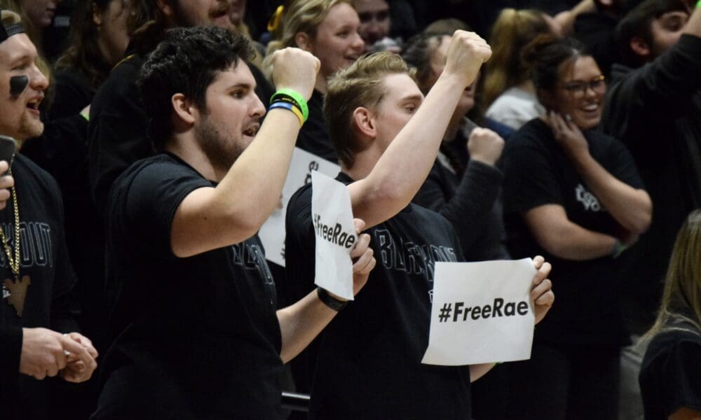 WVU Basketball #FreeRae signs