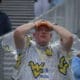 WVU Football fan hands on head during Utah game