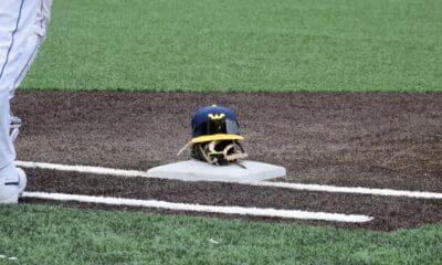 WVU Baseball hat and glove STOCK PHOTO