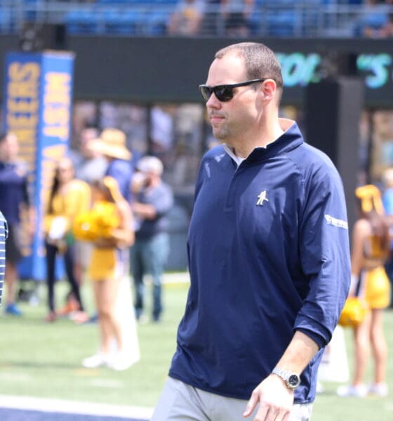 WVU AD Wren Baker on field
