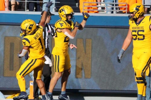 WVU Football Jahiem White and Preston Fox celebrate