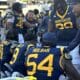 WVU Football Defense Celebrates Stop on the Bench