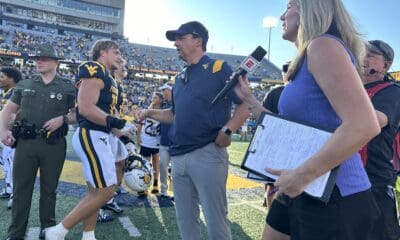 WVU Football HC Neal Brown with ESPN reporter