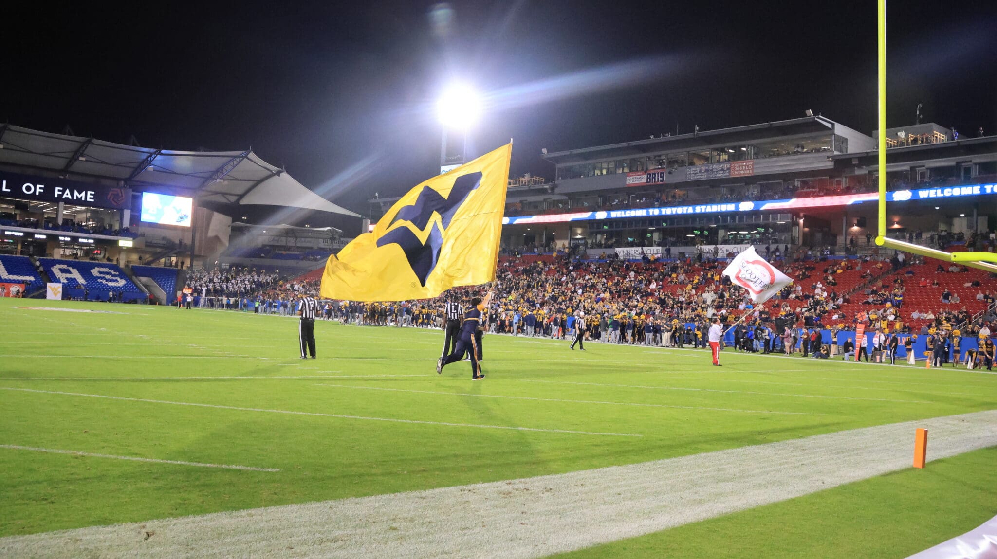 WVU Flag at Frisco Bowl stock