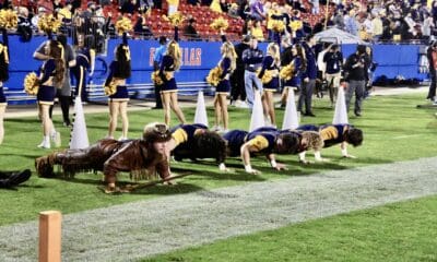 WVU cheerleaders and mascot at Frisco Bowl stock