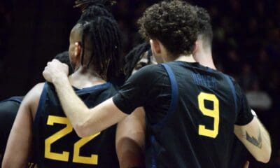 WVU Basketball Huddle/Black Uniform