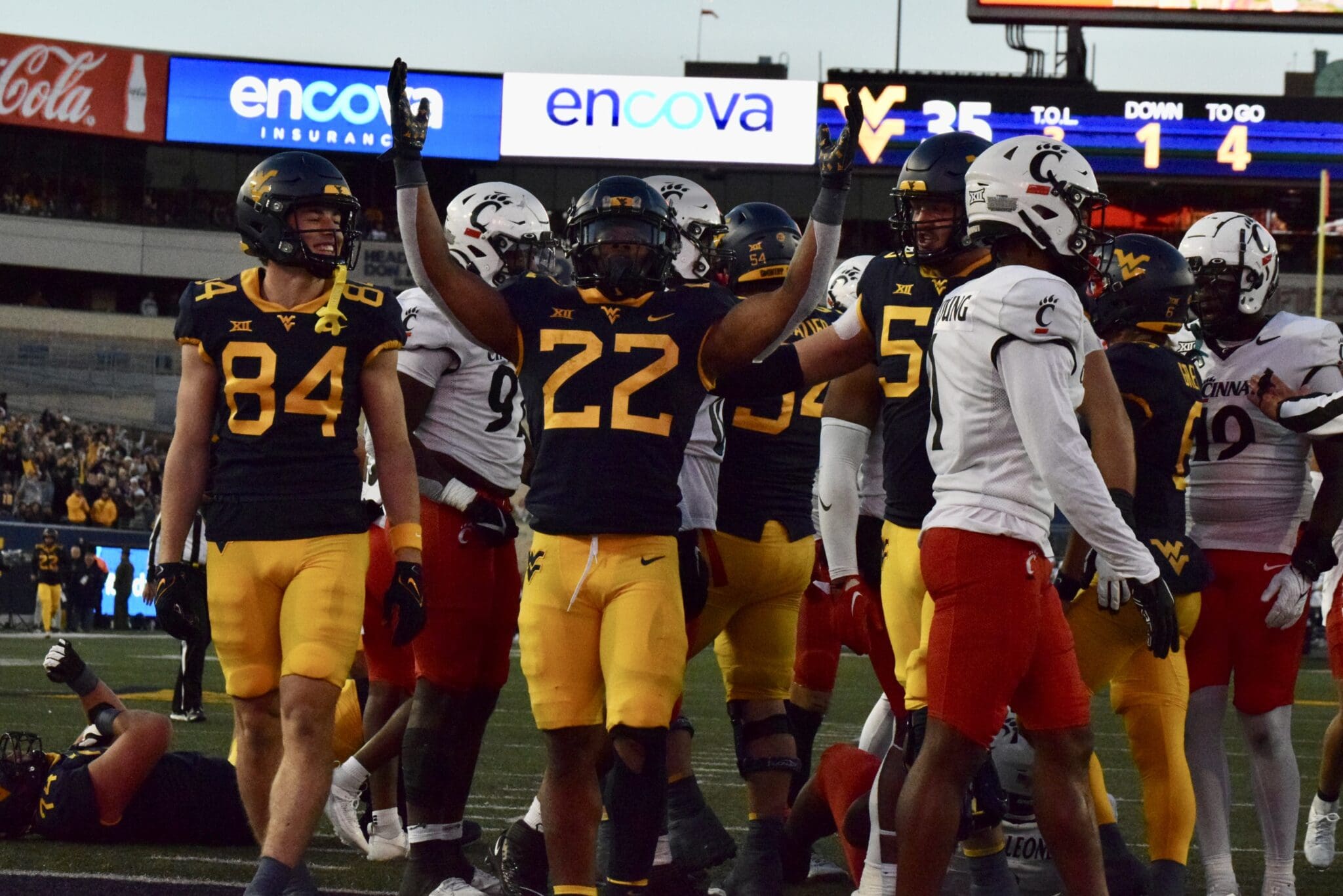 WVU Football RB Jahiem White celebrating after a TD