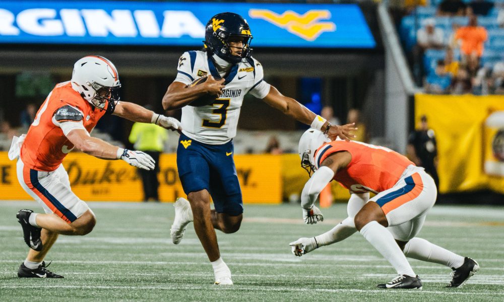 WVU Football QB Michael Hawkins in Mayo Classic against Virginia