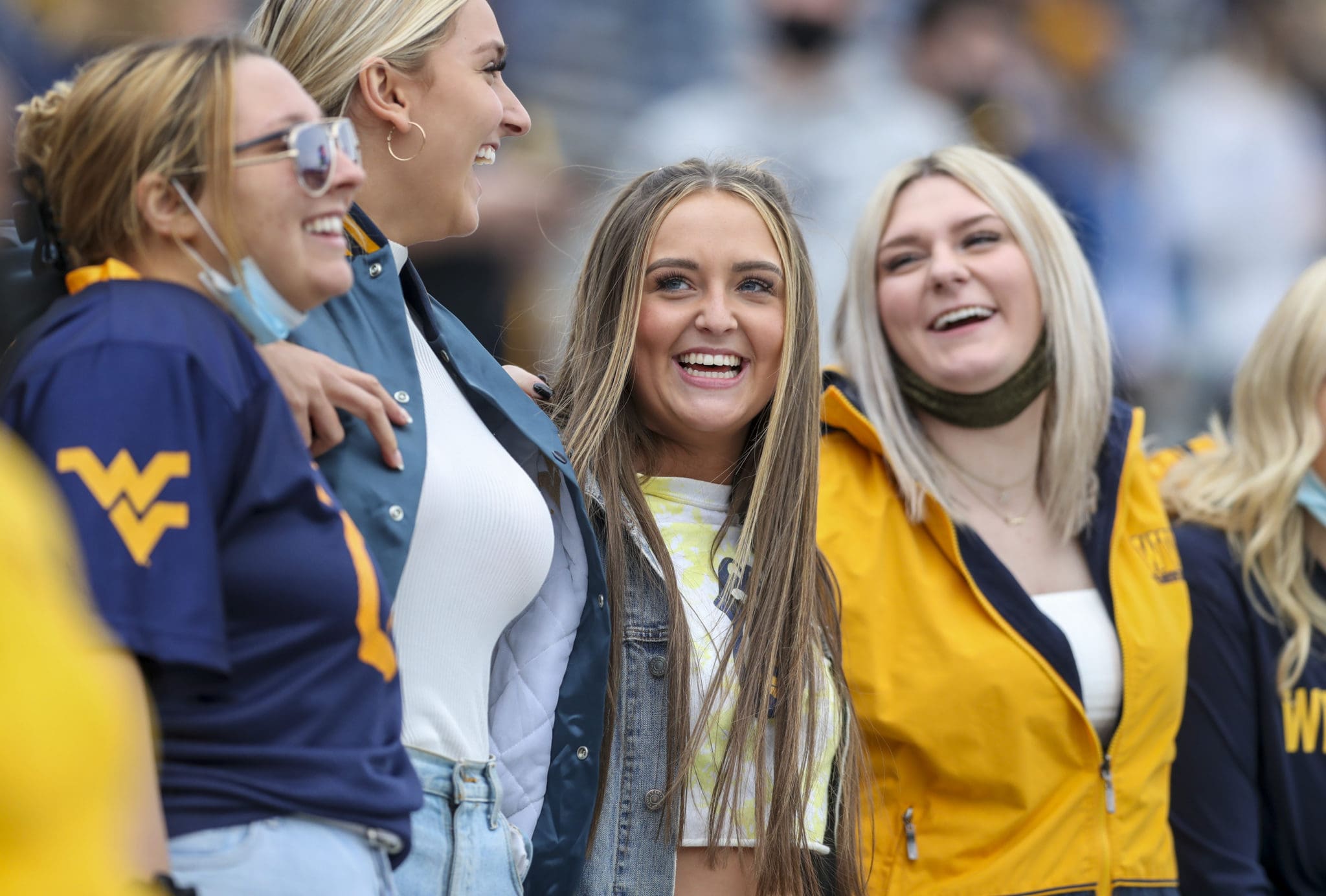 A group of female WVU Football fans