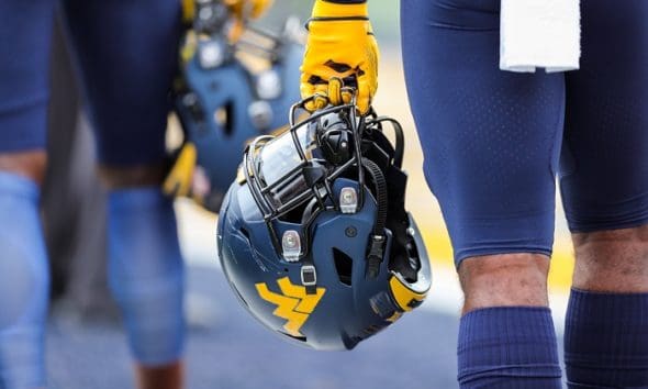 WVU Football carrying helmet stock