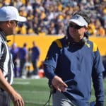 WVU Football HC Neal Brown and ref