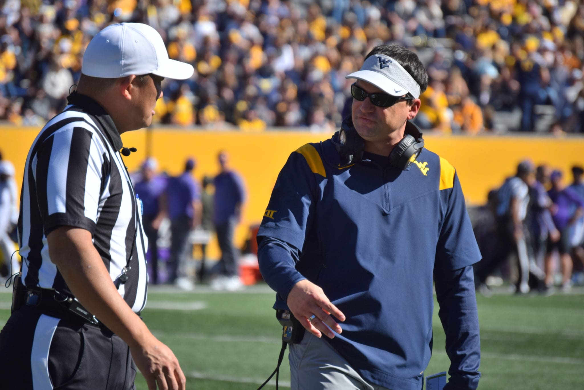 WVU Football HC Neal Brown and ref