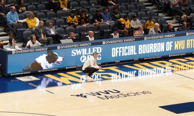 WVU Basketball HC Ross Hodge on court