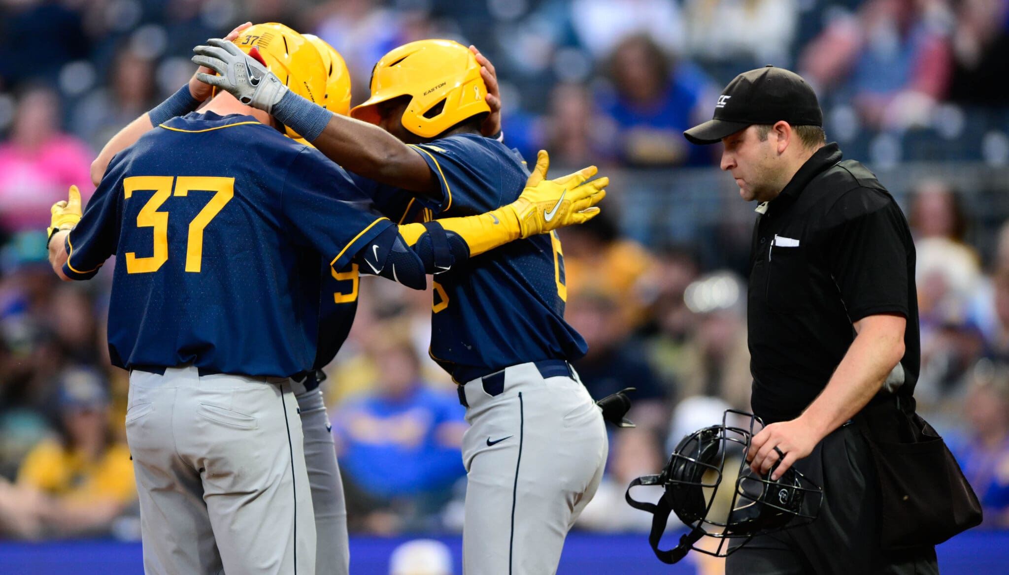 WVU Baseball players celebrating