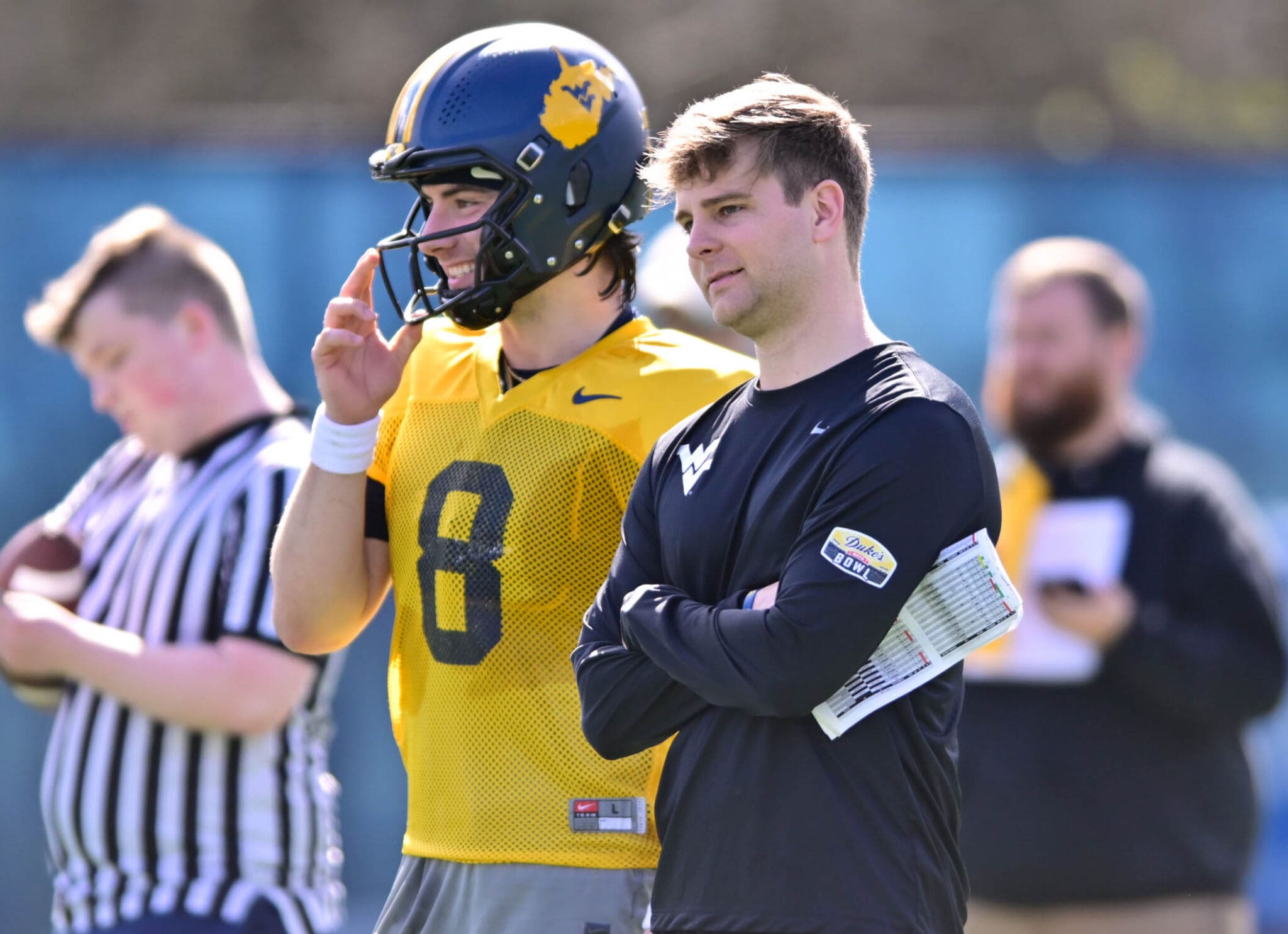 WVU Football QB Coach Tyler Allen with QB Nicco Marchiol