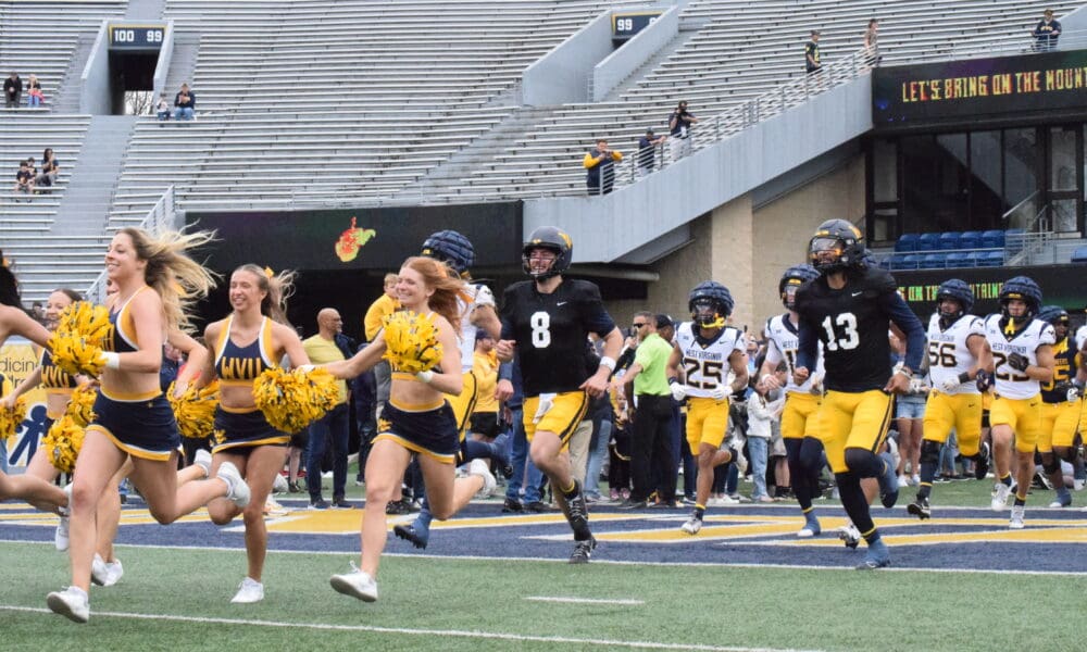WVU Football Jaylen Henderson and Nicco Marchiol at spring showcase