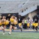 WVU Football Jaylen Henderson and Nicco Marchiol at spring showcase