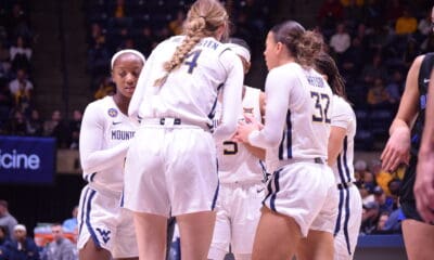 WVU women’s basketball huddle