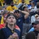 WVU Football fan hands on head during Utah game