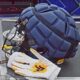 WVU Football helmet and gloves stock