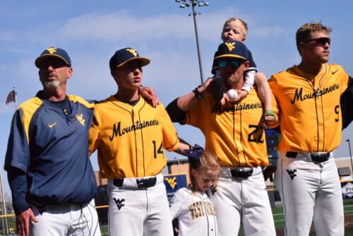WVU Baseball Randy Mazey, Steve Sabins and Grant Hussey celebrating after win