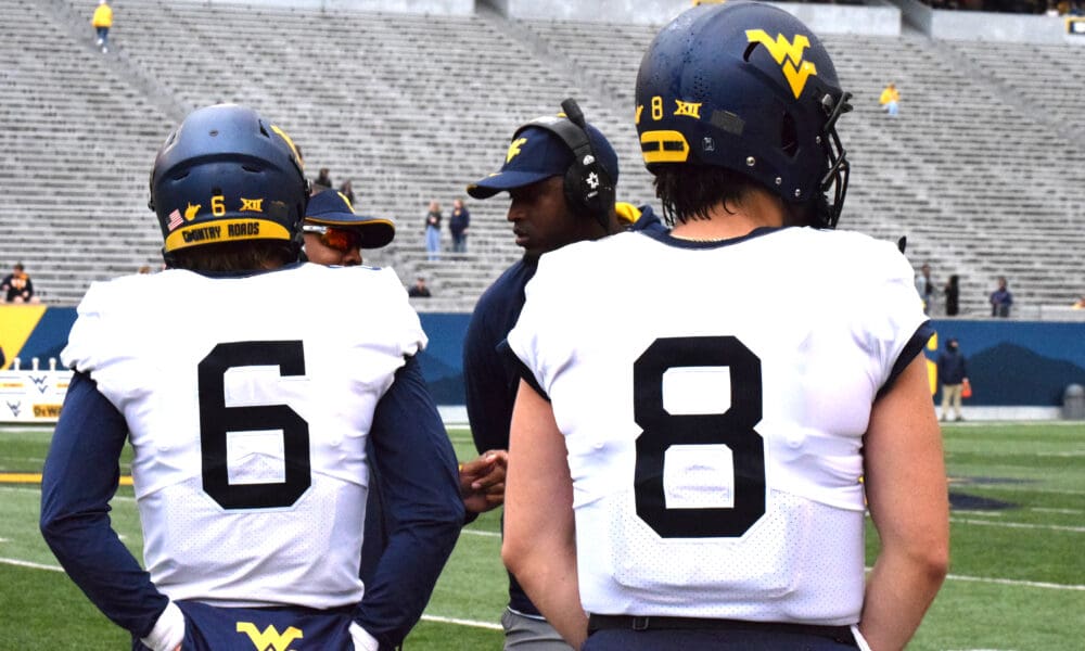 WVU's quarterback competition between Garrett Greene and Nicco Marchiol