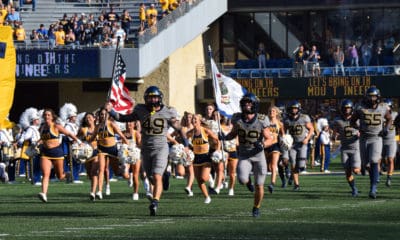 WVU football with US and WV flag