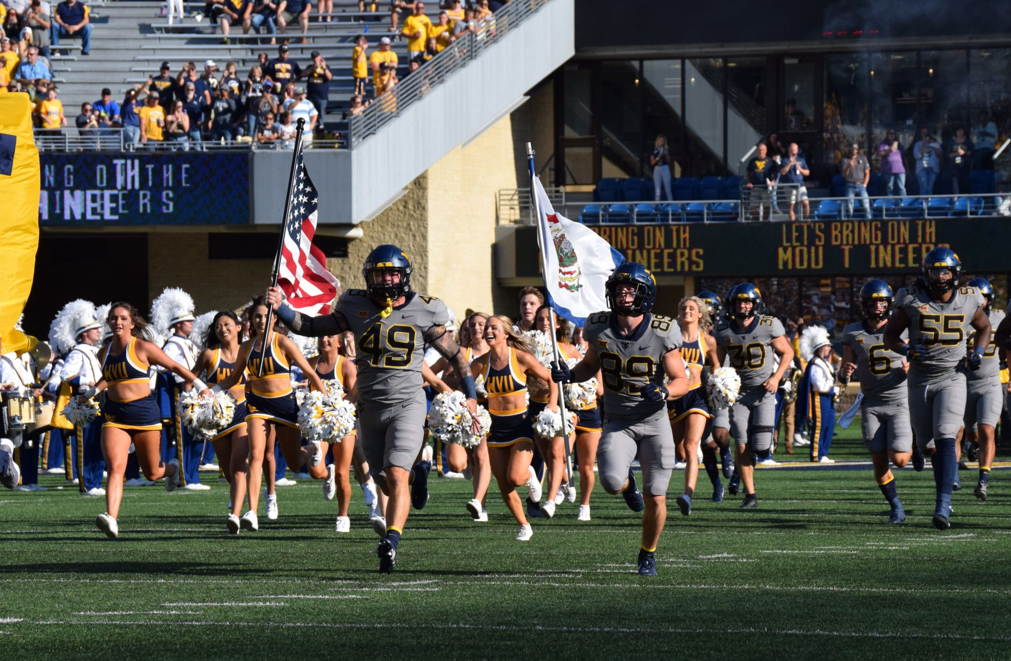 WVU football with US and WV flag