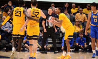 WVU Basketball Honor Huff clapping to Treysen Eaglestaff against Pitt