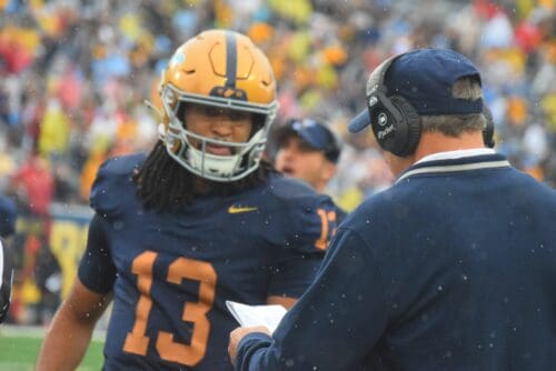WVU Football QB Jaylen Henderson and Head Coach Rich Rodriguez