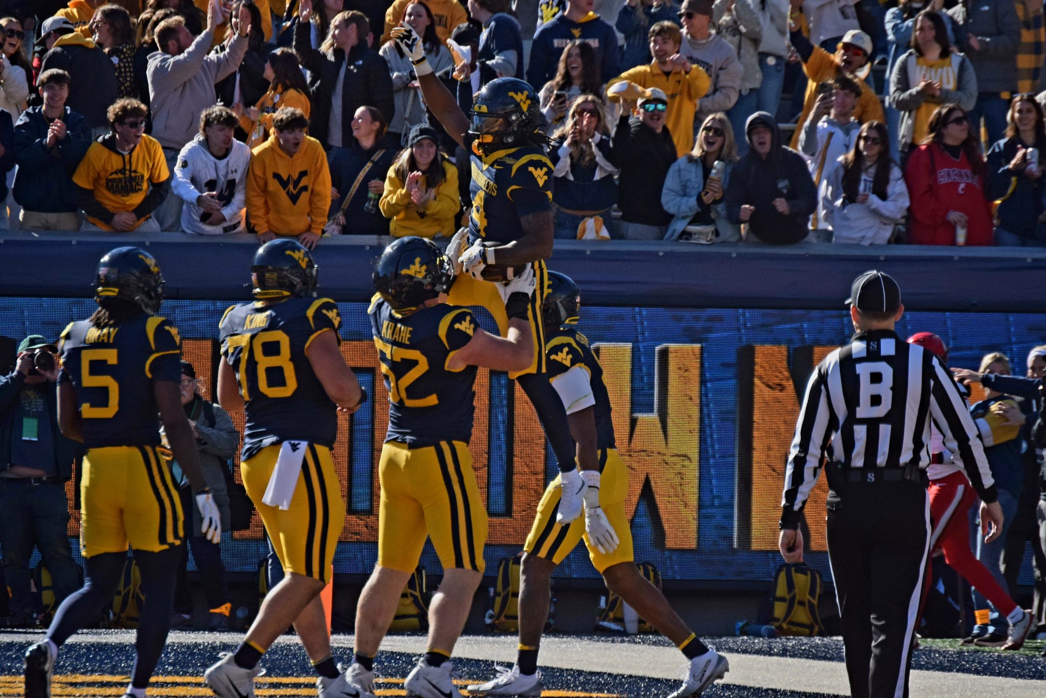 WVU Football OL Nick Krahe lifts Cam Cook
