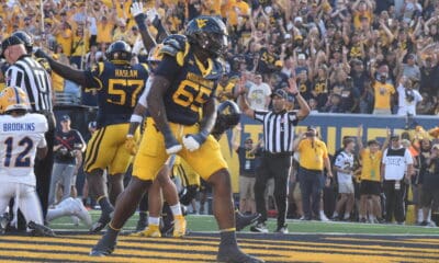 WVU Football OL Malik Agbo celebrates touchdown against Pitt