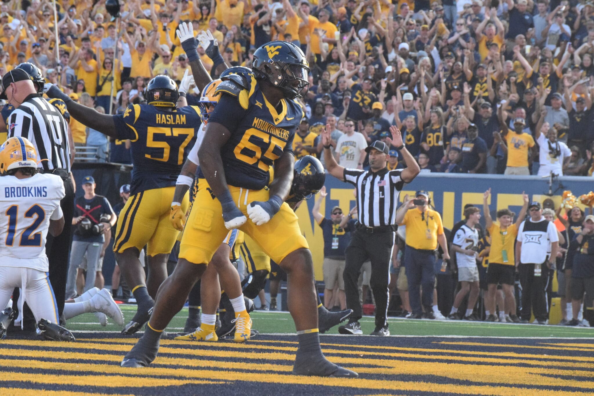 WVU Football OL Malik Agbo celebrates touchdown against Pitt