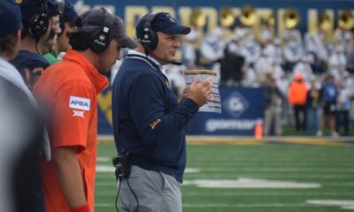WVU Football HC Rich Rodriguez on field during game