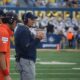 WVU Football HC Rich Rodriguez on field during game
