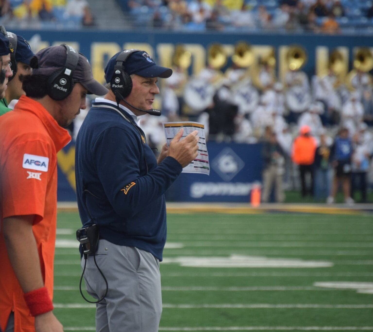 WVU Football HC Rich Rodriguez on field during game