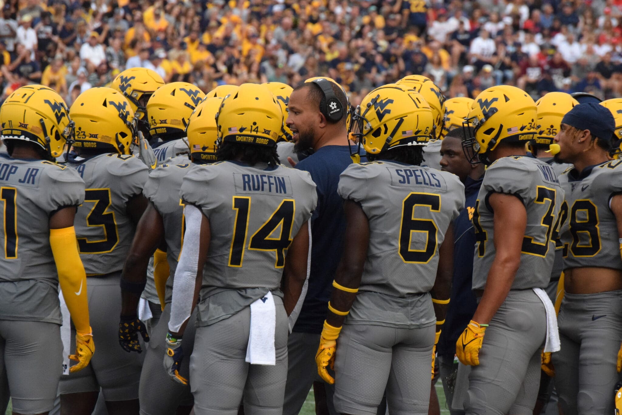 WVU Football Secondary with coach Donate Wright in the middle
